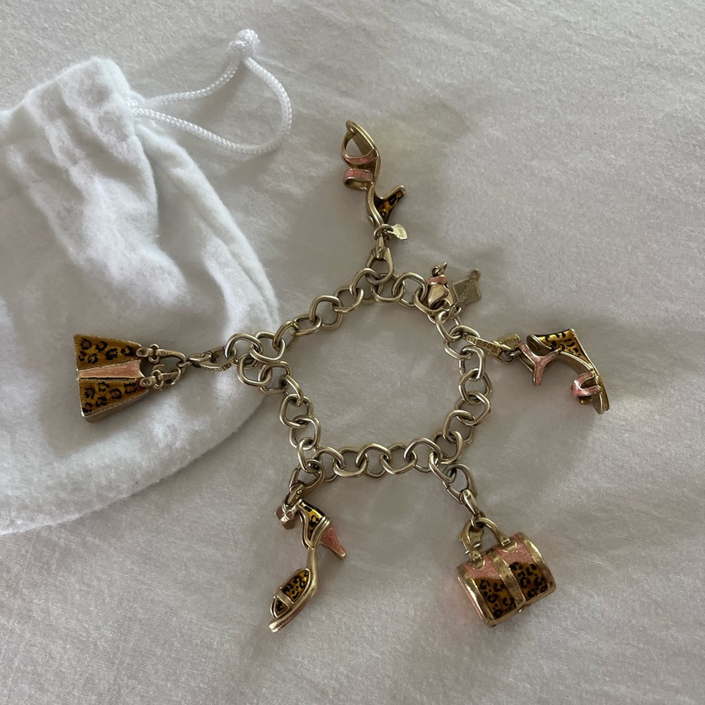 18k gold plated Rosato Bracelet with 5 collector charms.